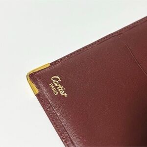 Cartier Burgundy Leather Wallet with Gold Accents
